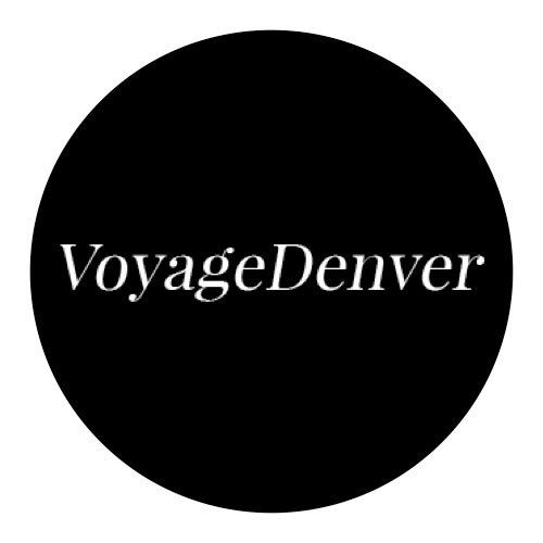 The logo for voyage denver is a black circle with white text on it.