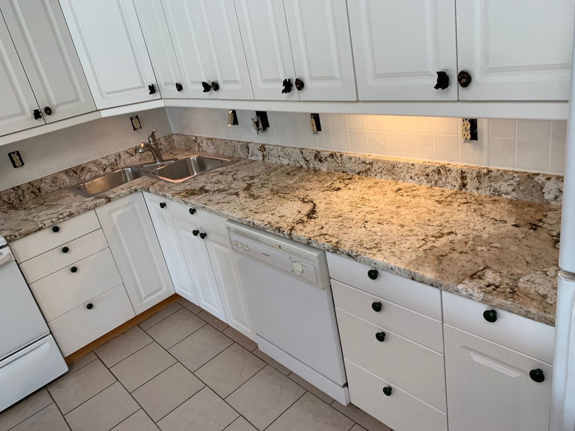 kitchen island made of granite combine white cabinet