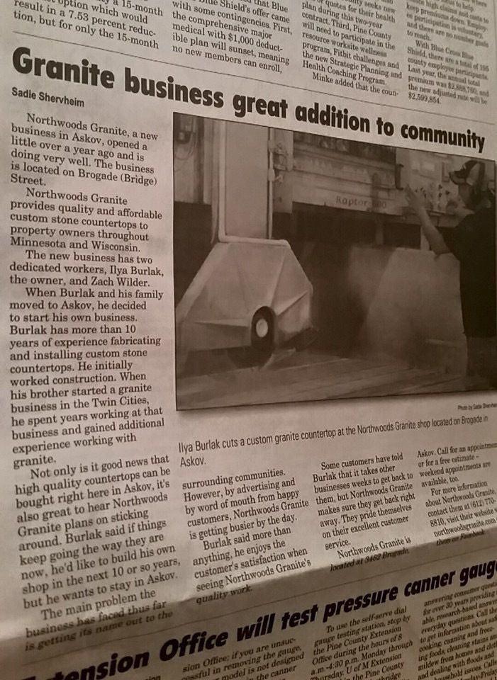 news paper talking about NorthWoods Granite success story