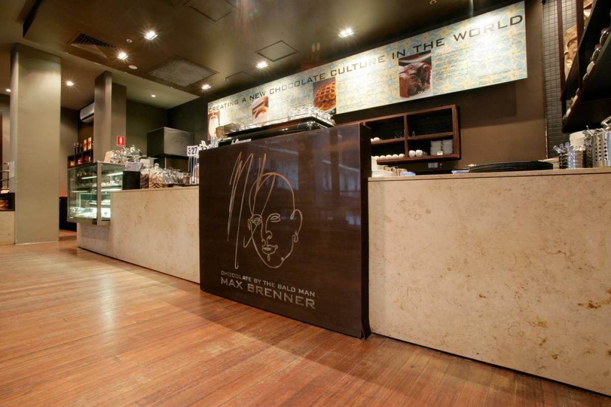 A Restaurant With A Wooden Floor And A Sign That Says ' Max Wiener ' On It — The Garis Group  In Hamilton, NSW 