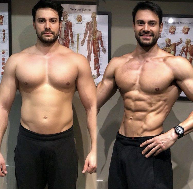 Two shirtless men are standing next to each other
