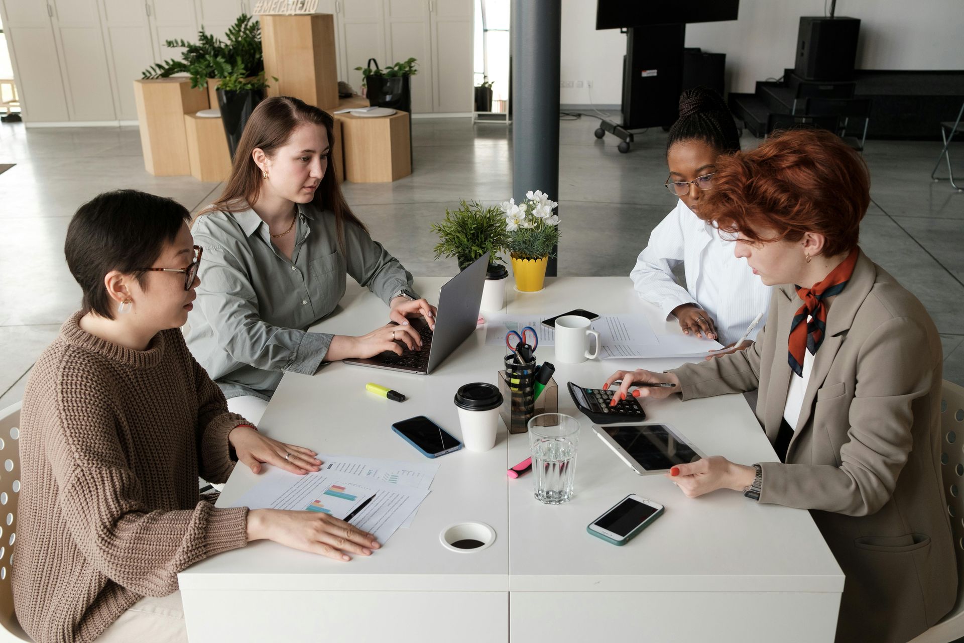 A woman is riding an electric bike on a road.