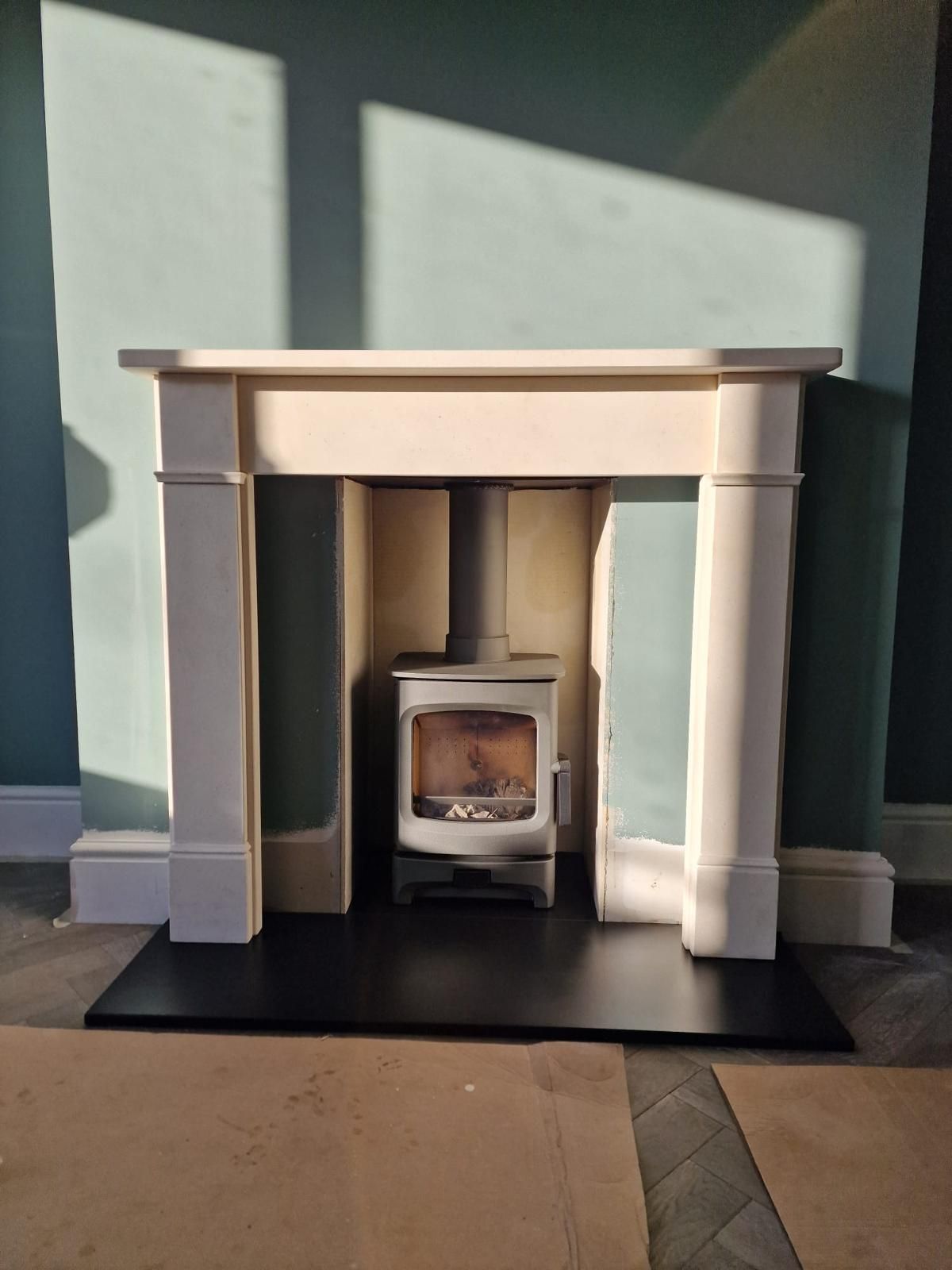 Charnwood Aire 5 Stove With Limestone Surround Fitted In Bembridge Isle of Wight 