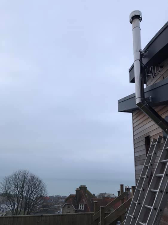 Chimney Flue Installation By the Fireplace Isle of Wight
