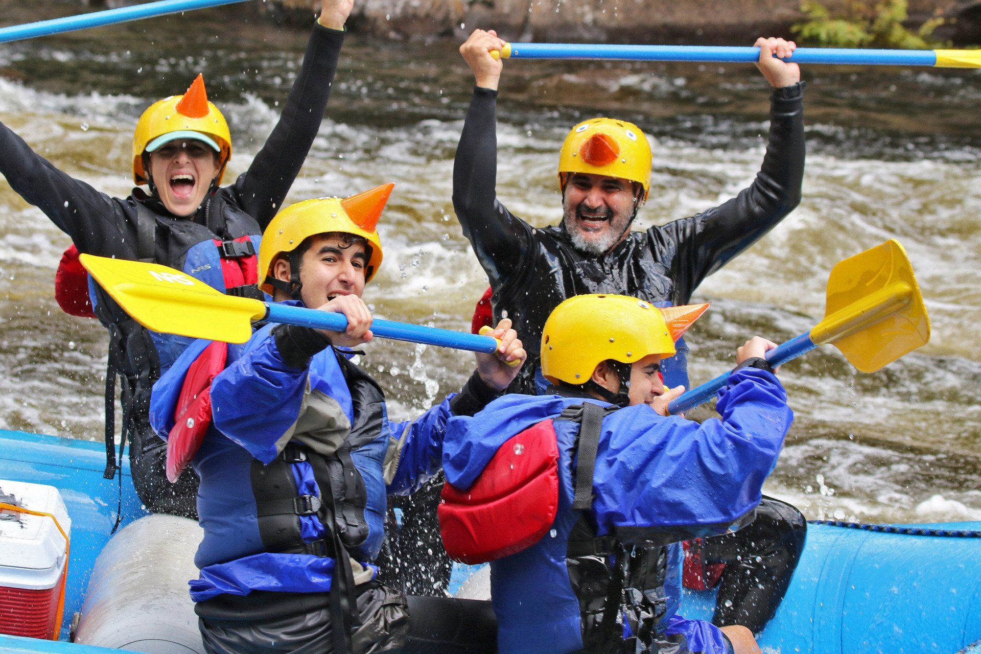 People enjoying in whitewater