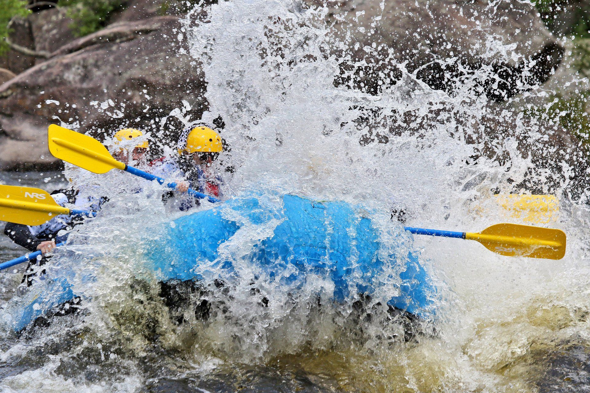 Whitewater splash on rafting boat