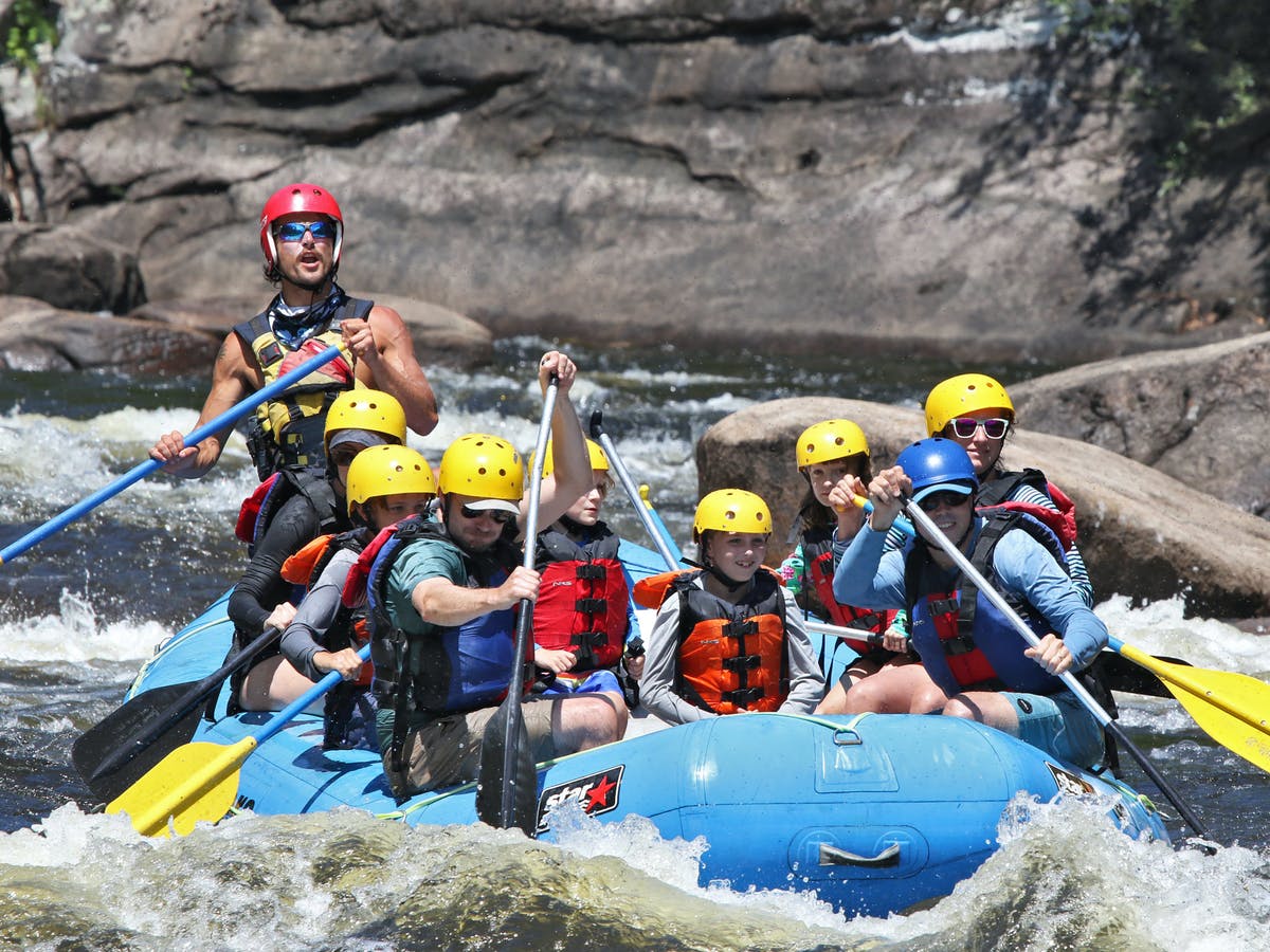 Family happy while rafting