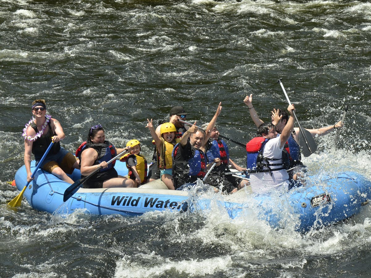 Far view of people enjoying their rafting