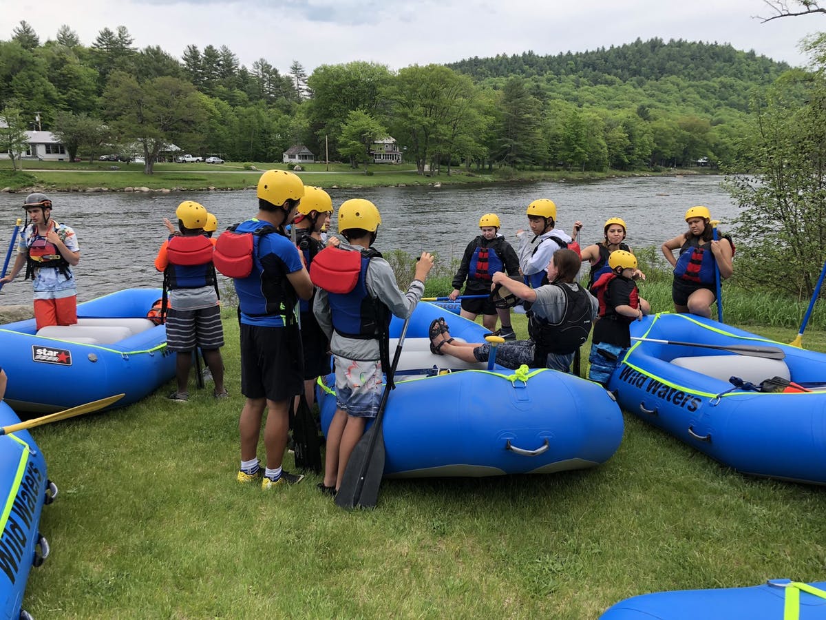 People preparing for their rafting