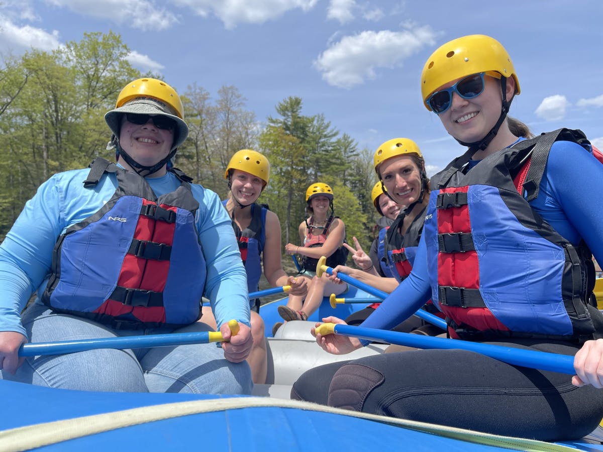 Near view of ladies sitting on rafting boat