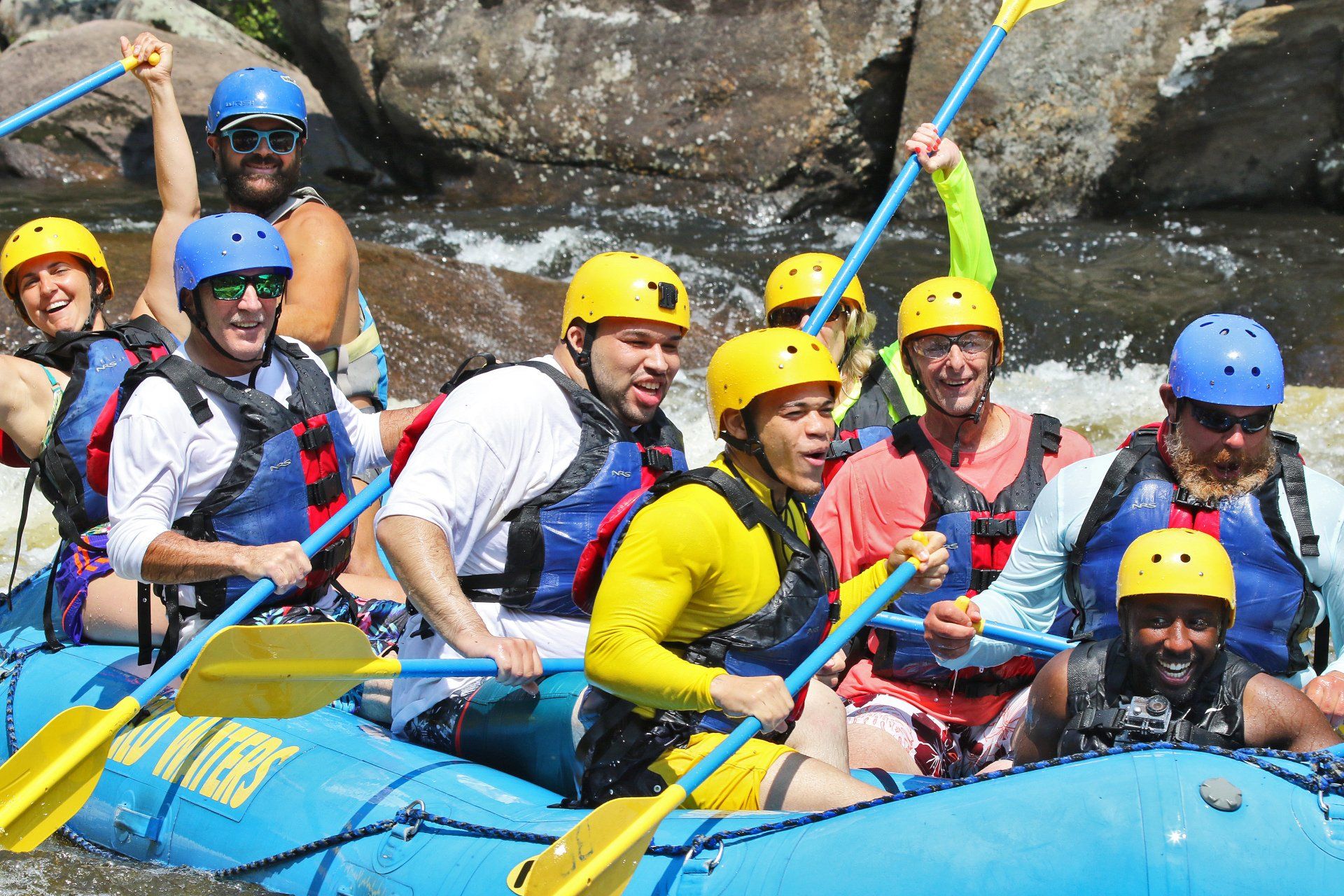 Group of people enjoying rafting