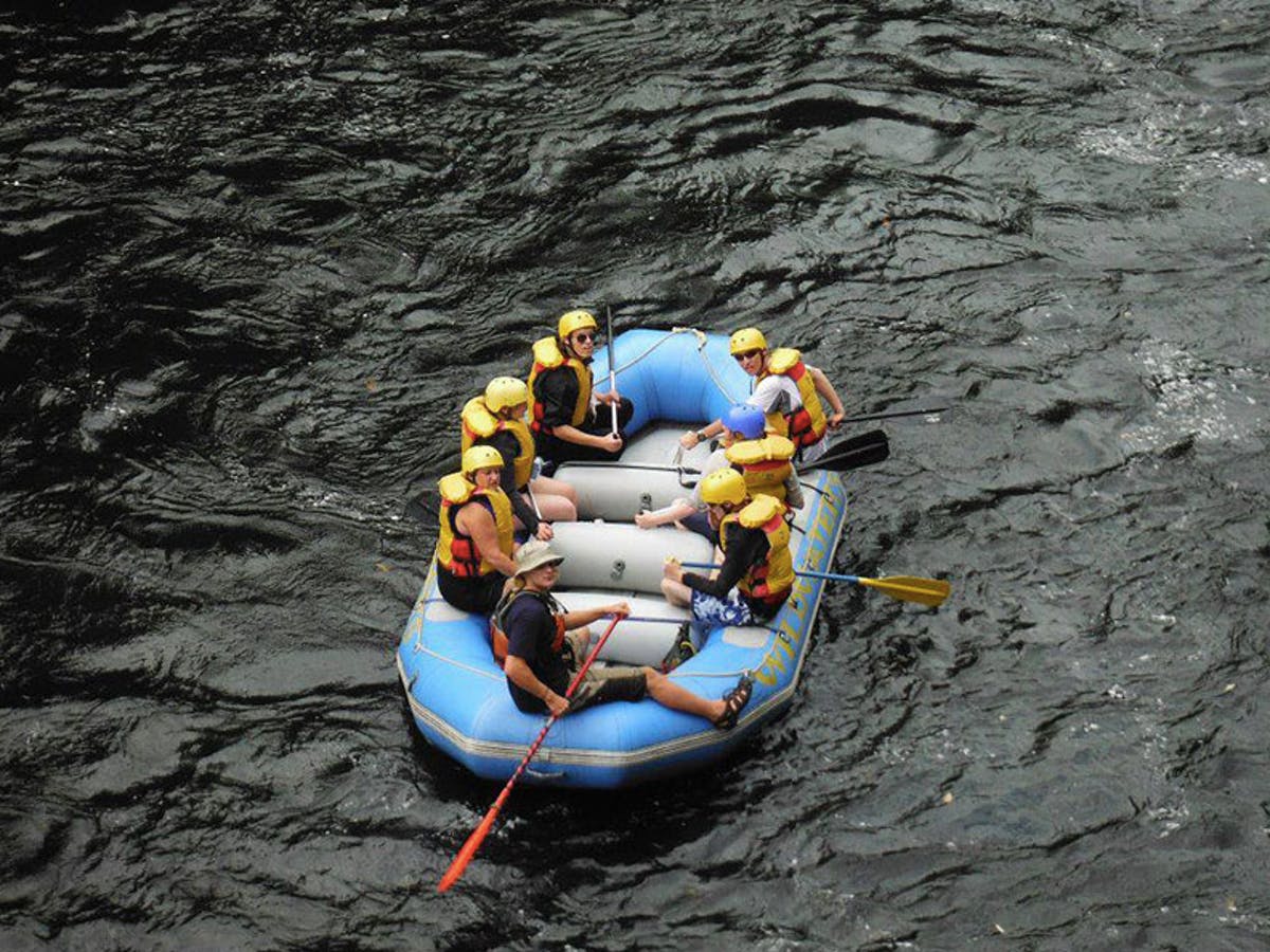 Top view of people in rafting boat