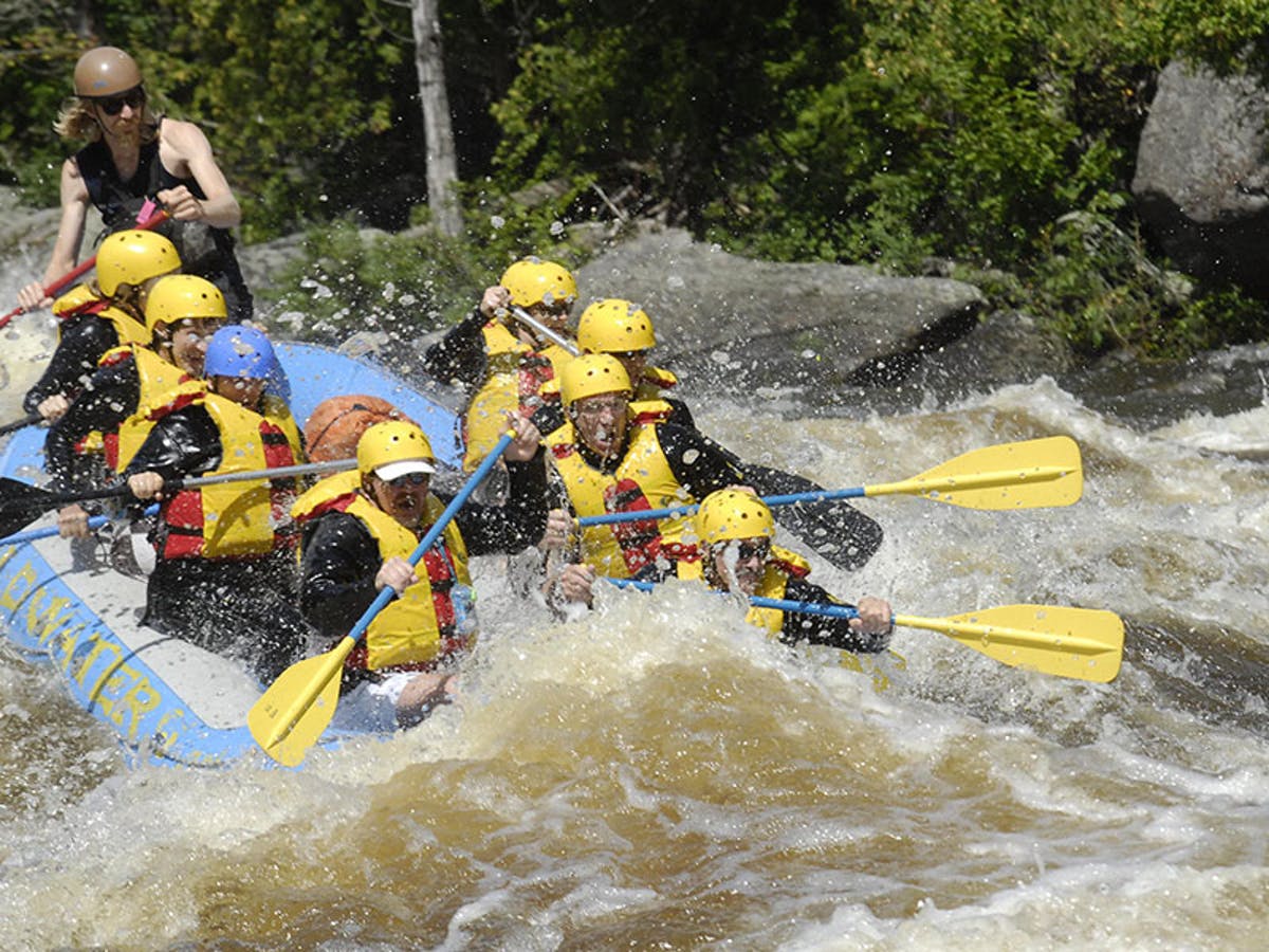 Group of people with yellow life vest
