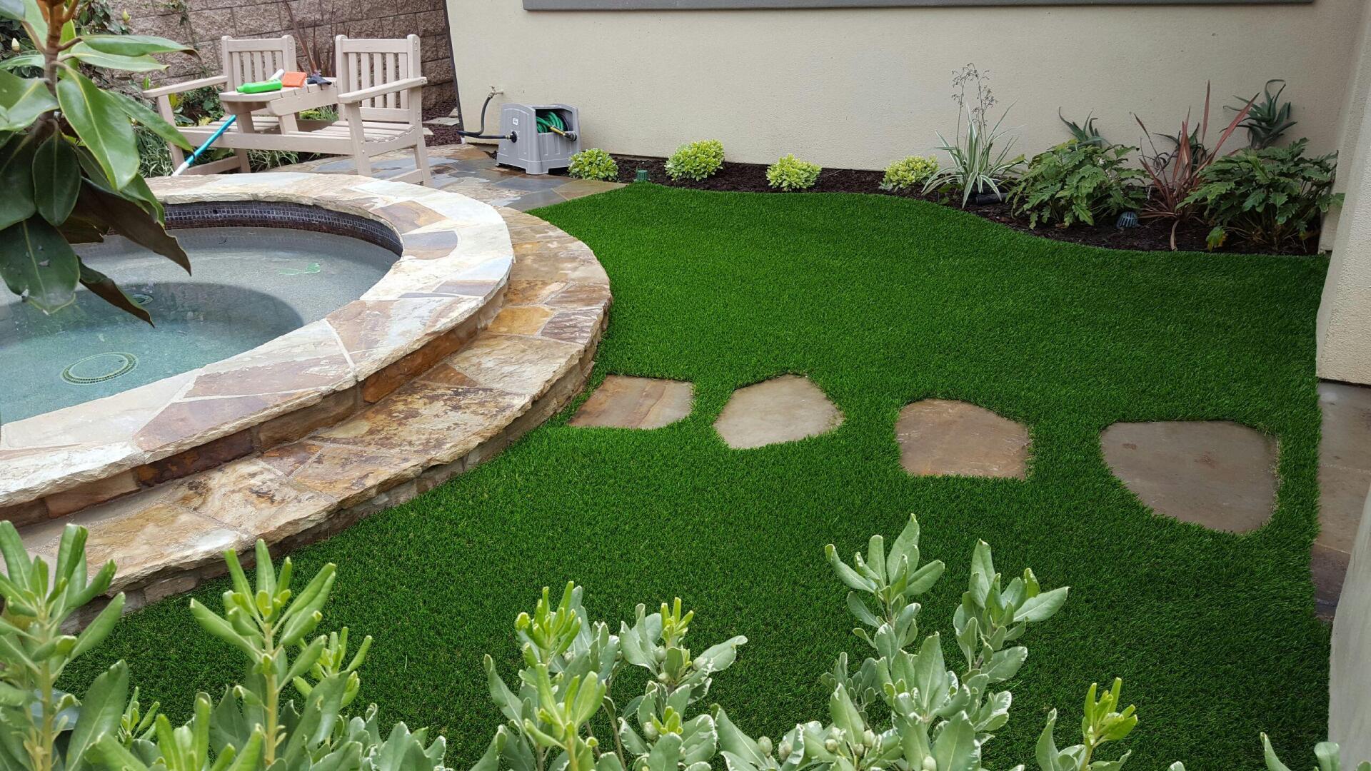 artificial grass around fountain