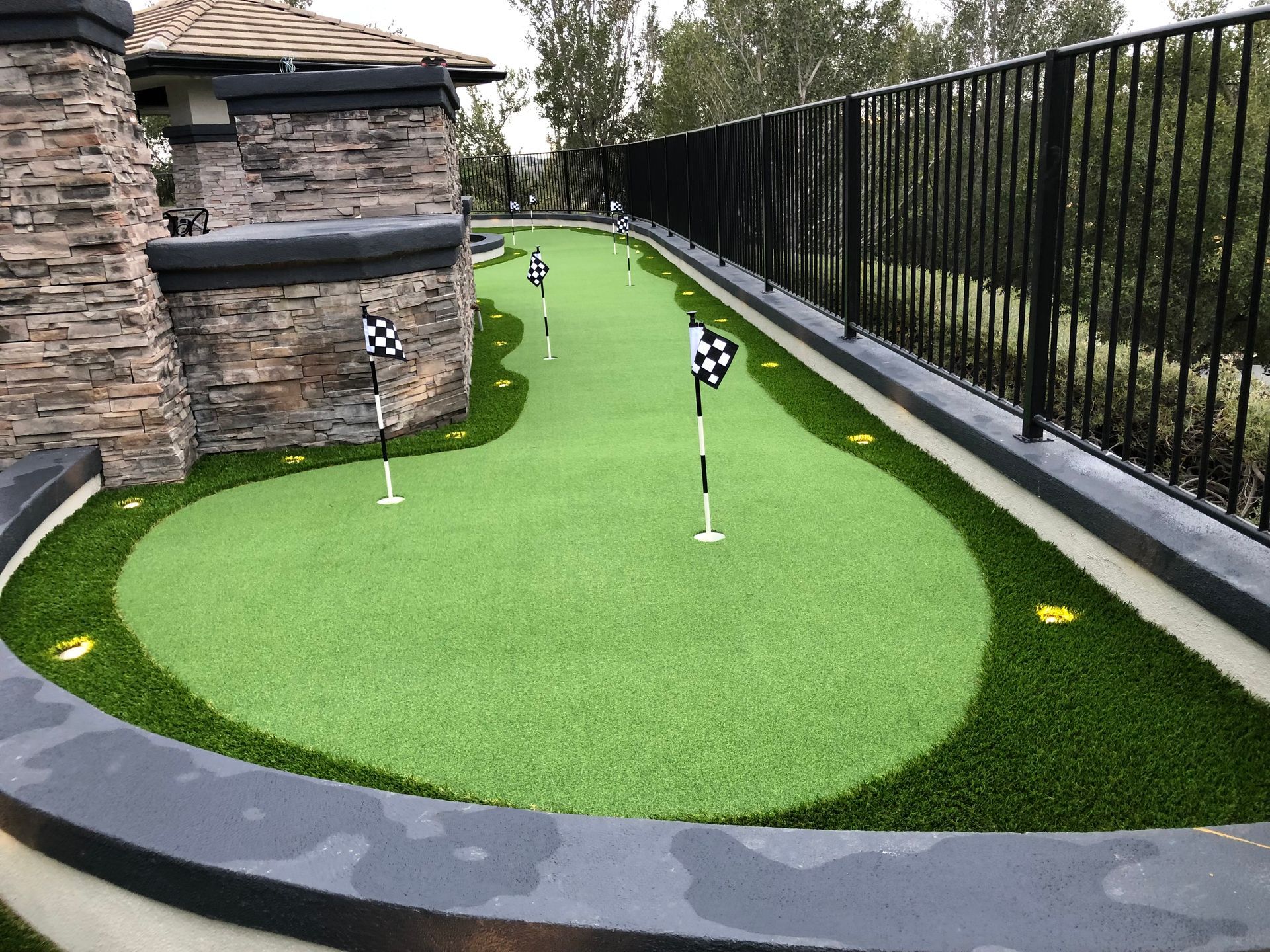 artificial putting green near pillar