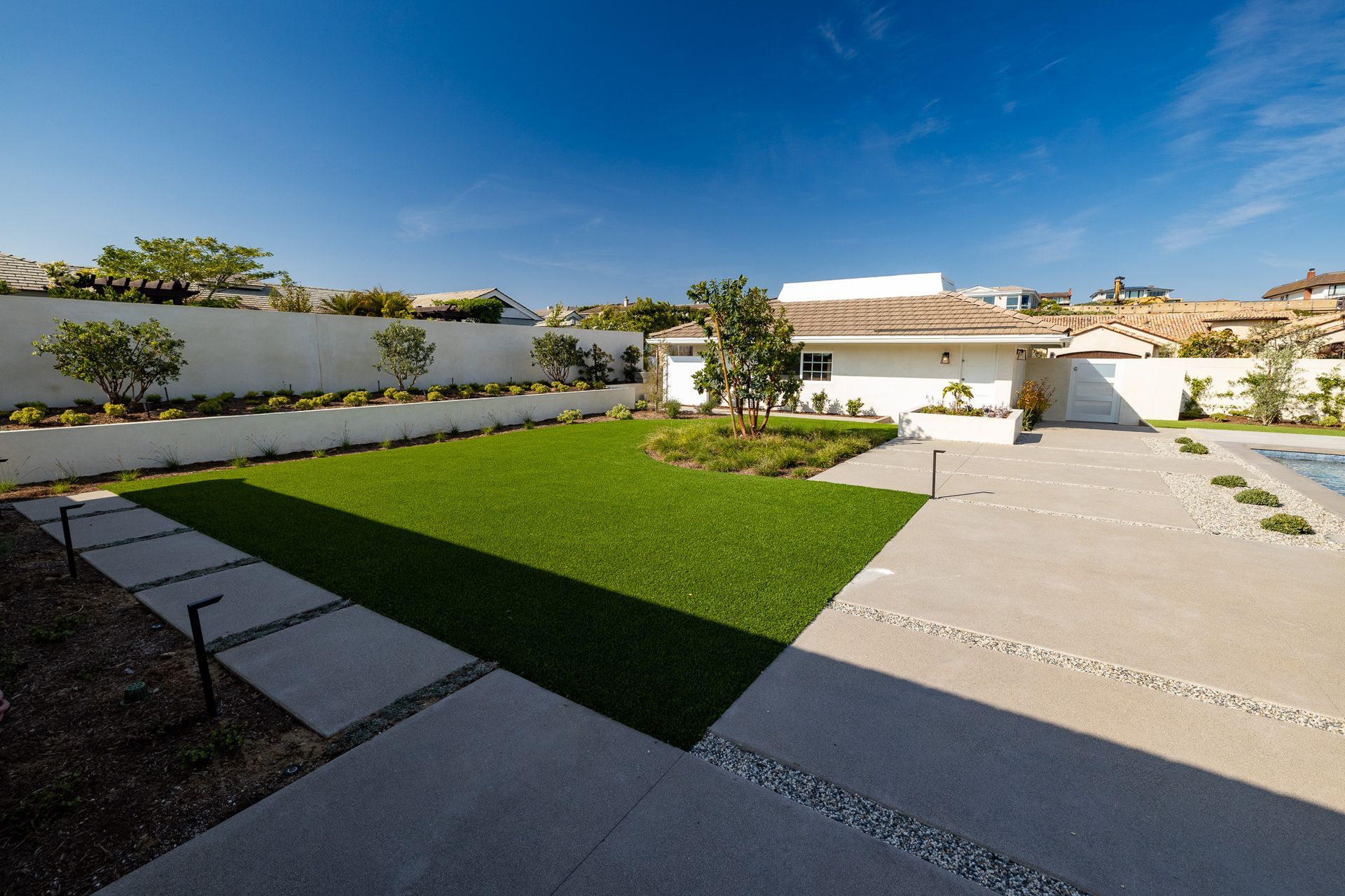 rock feature near  artificial grass