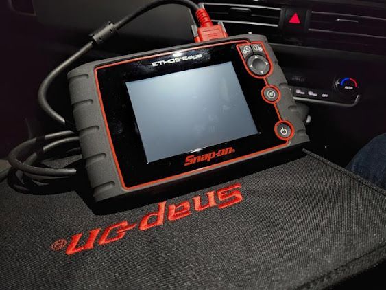 A Snap on Device is Sitting on a Black Mat — Hive Mobile Roadworthy in Southport, QLD