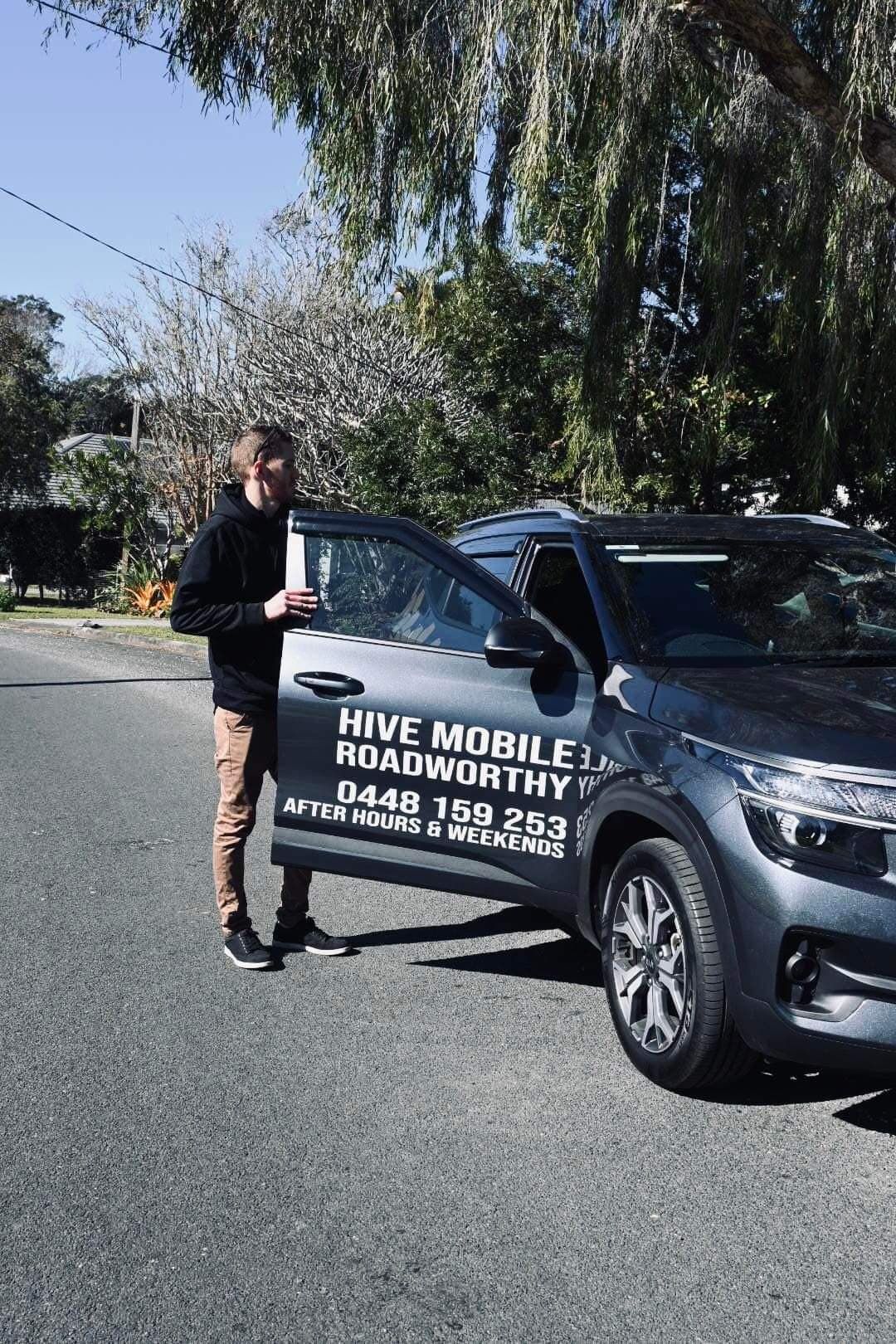 Auto Mechanic Working on a Car in His Garage — Hive Mobile Roadworthy in Highland Park, QLD