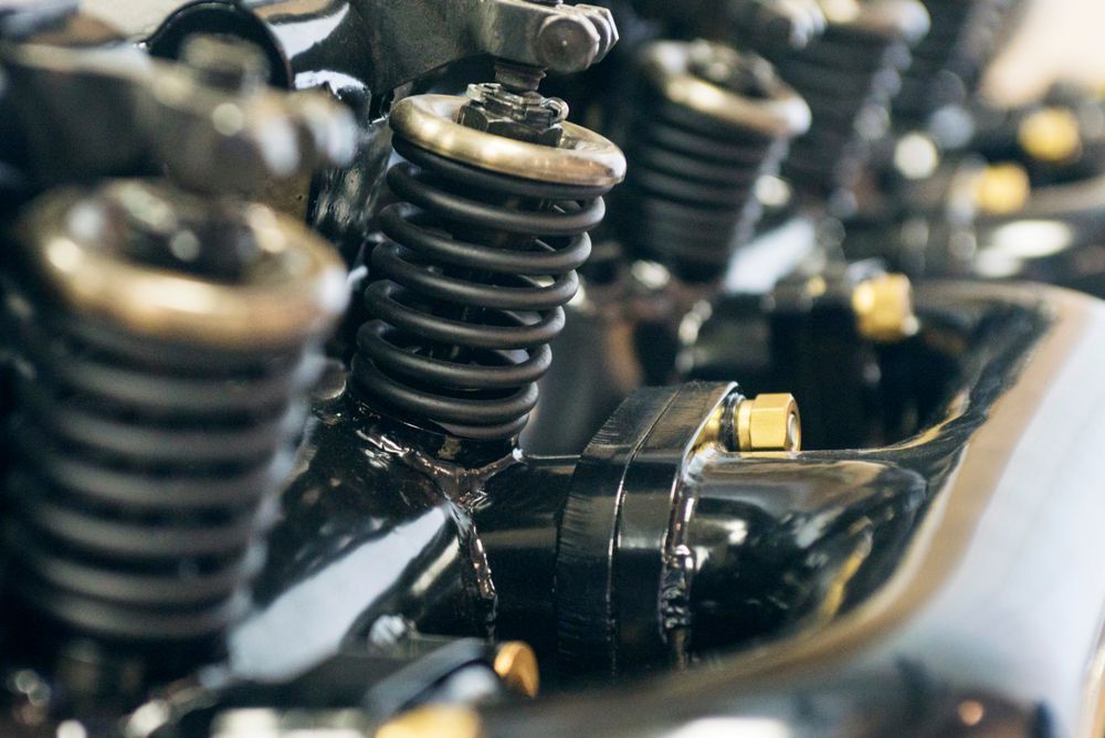 A Close Up of an Engine With Coil Springs — Hive Mobile Roadworthy in Robina, QLD
