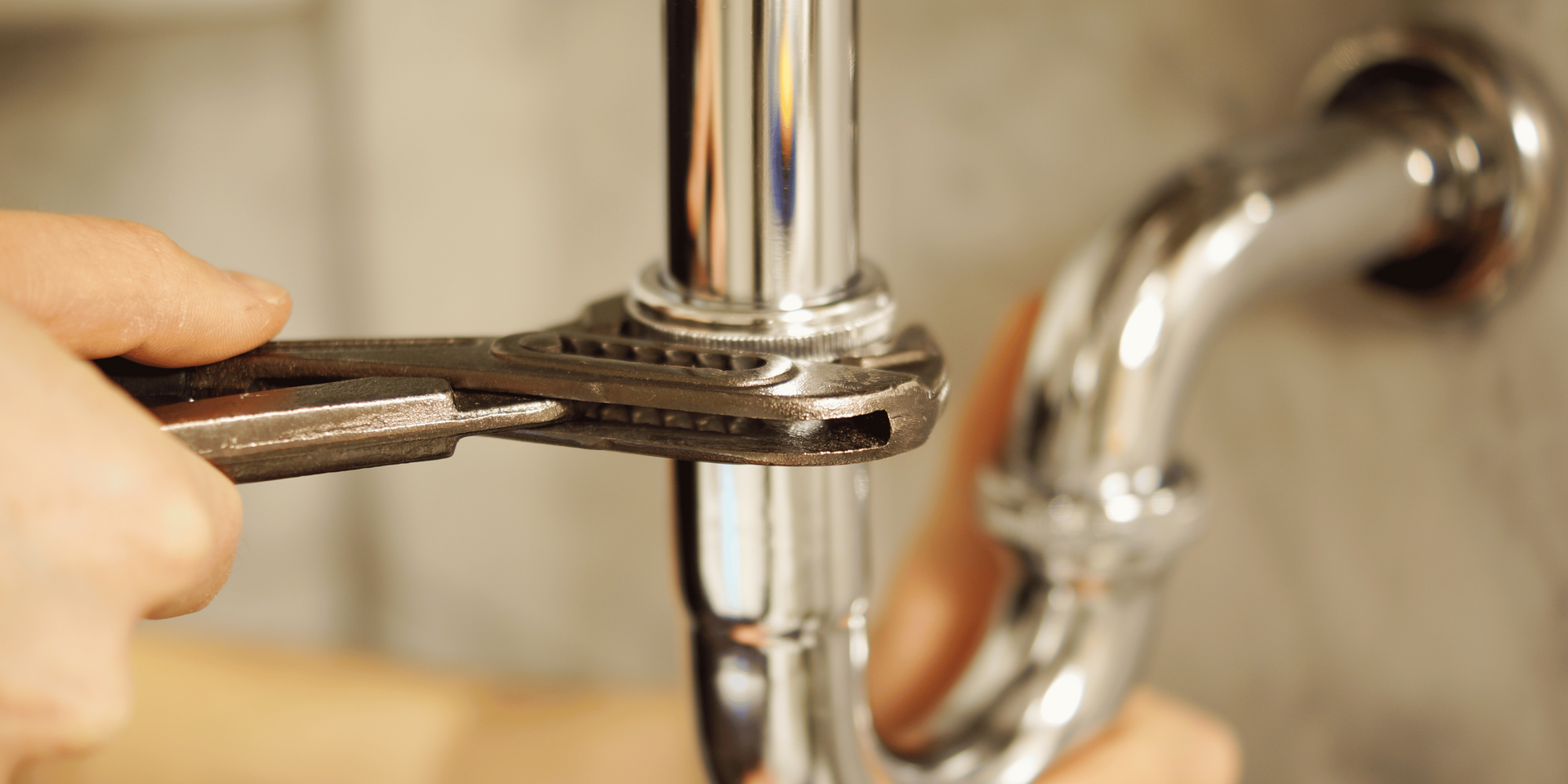 A bathroom with two sinks , two mirrors and a walk in shower.