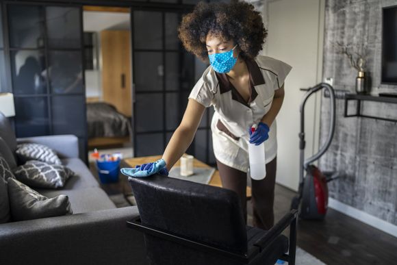 Woman Cleaning The Room — DFW Airport, TX — Spotless Woman Cleaning The Room — DFW Airport, TX — Spotless