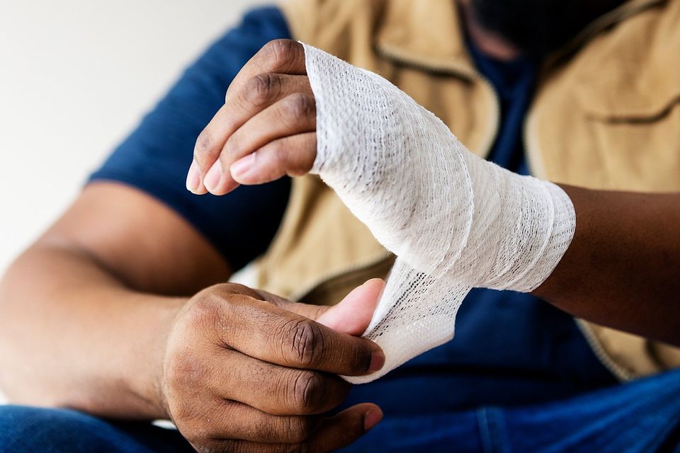 Man with Bandaged Hand — Fairmont, WV — Higinbotham & Higinbotham, PLLC