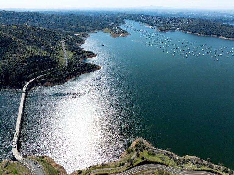 A drone view of Bidwell Bar Bridge and Bidwell Canyon Marina at Lake Oroville in Butte County, California.