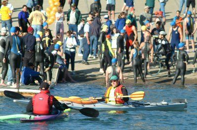 A group of people are in kayaks in the water