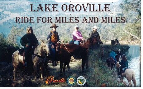 A group of people riding horses on a sign that says lake oroville ride for miles and miles