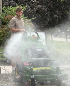 Professional lawn mowing service in the Quad Cities area, covering Moline, Davenport, Bettendorf, and Rock Island