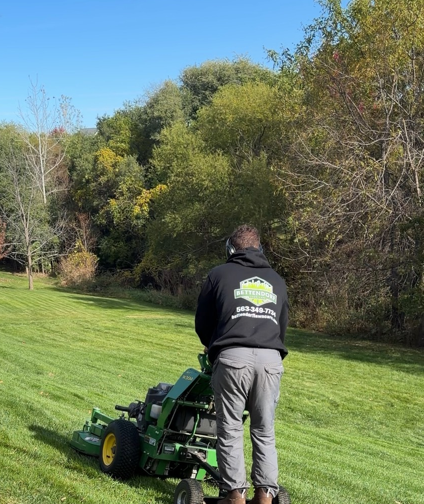 Professional lawn mowing service in the Quad Cities area, covering Moline, Davenport, Bettendorf, and Rock Island