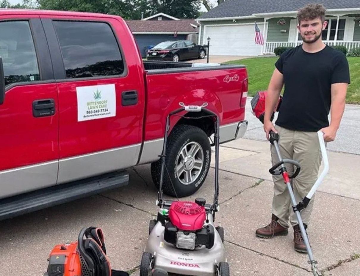 Professional lawn mowing service in the Quad Cities area, covering Moline, Davenport, Bettendorf, and Rock Island