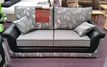 grey coloured sofa