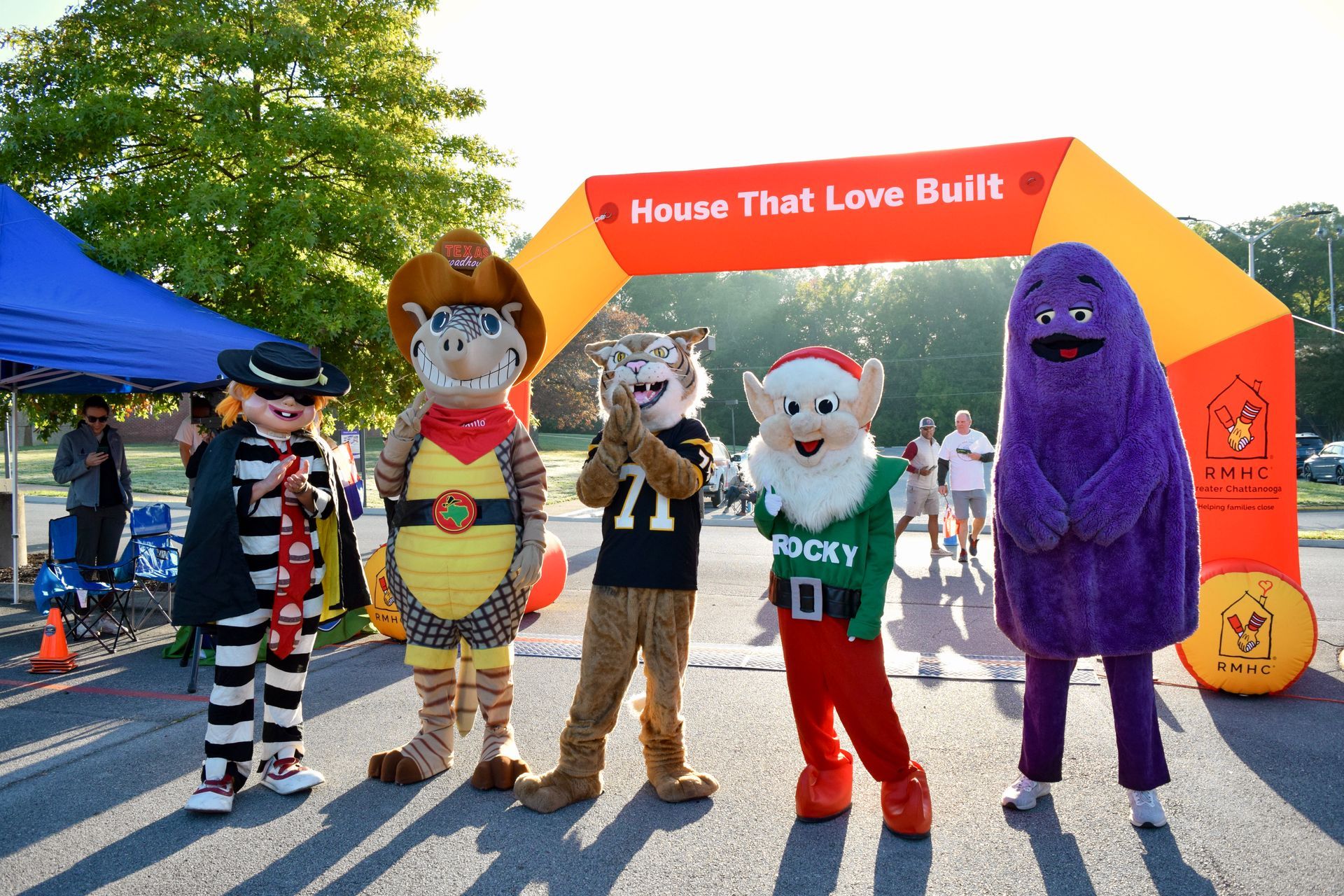 Two young men are posing for a picture with medals around their necks.