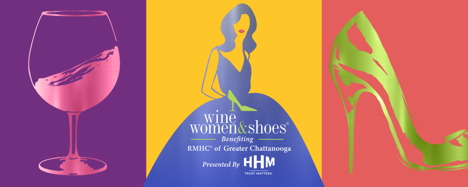 A woman in a pink dress is walking down a street.