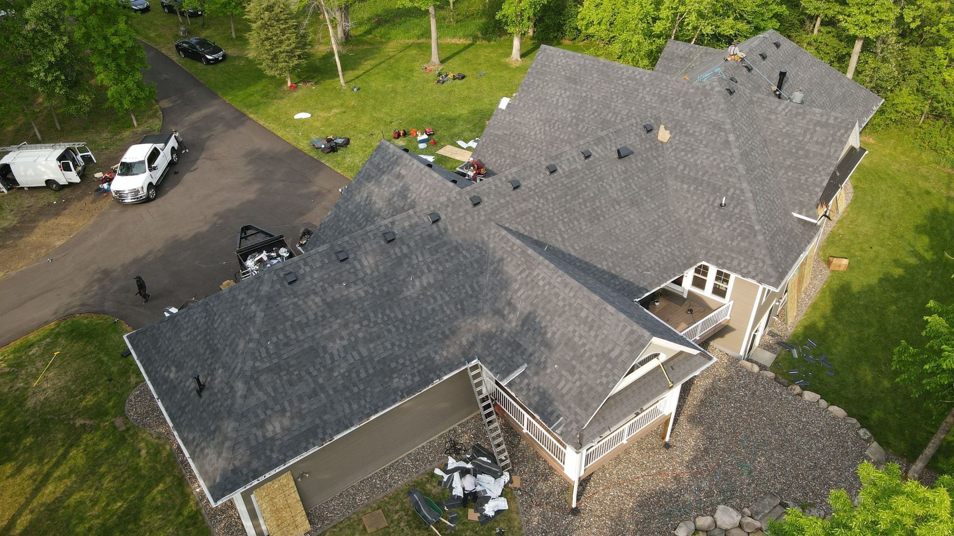 A kitchen with wooden cabinets and stainless steel appliances.