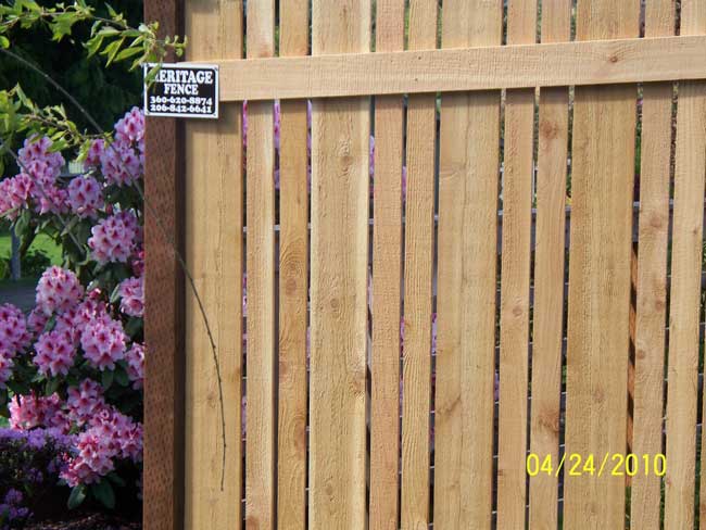 Fence — Wooden Fence and Flowers in Poulsbo, WA