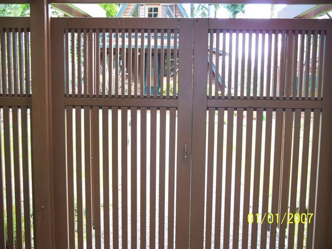 Fence — Brown Wooden Fence in Poulsbo, WA