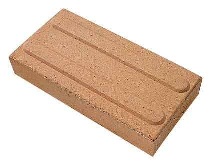 Brown brick with three parallel channels carved into the top surface.