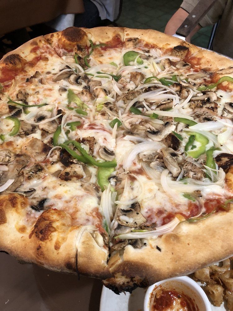 Pizza with Onion and Bell Pepper — Creedmoor, NC — Rino's Italian Grill and Pizza