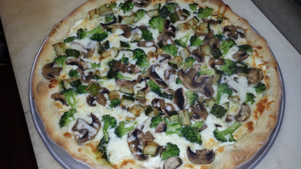 Pizza with Mushroom and Brocolli — Creedmoor, NC — Rino's Italian Grill and Pizza