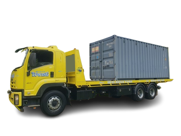 A yellow truck with a container on the back of it