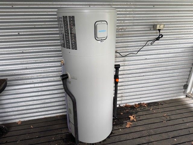 HVAC gauges: blue and red pressure gauges with yellow, blue, and red hoses.