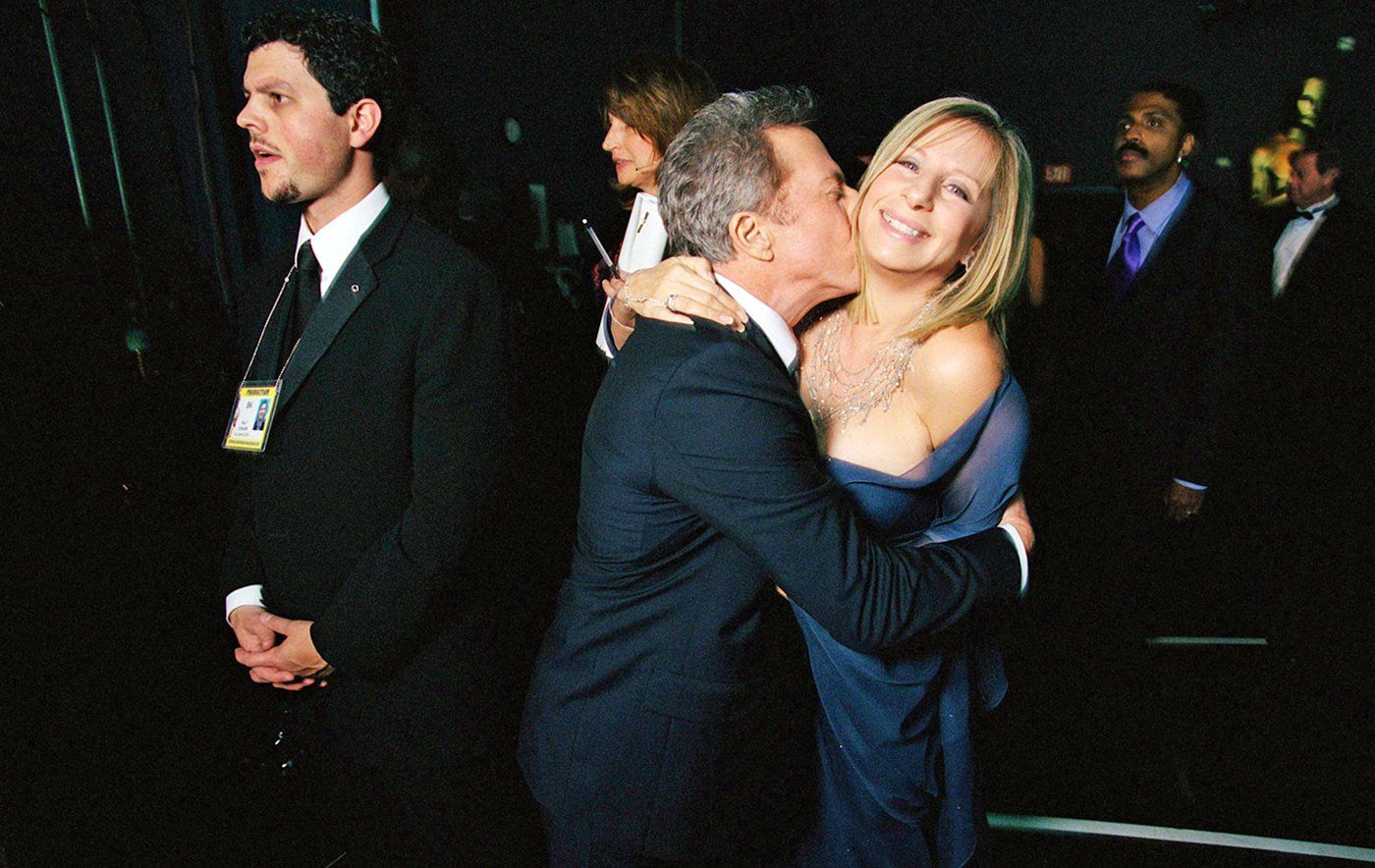 Dustin Hoffman and Barbra Streisand present an award at the 2005 Oscars.