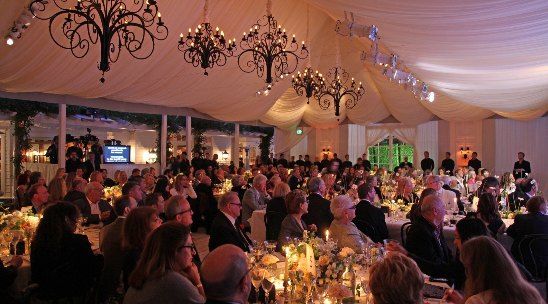 Under the tent of Streisand's fundraiser at her home.