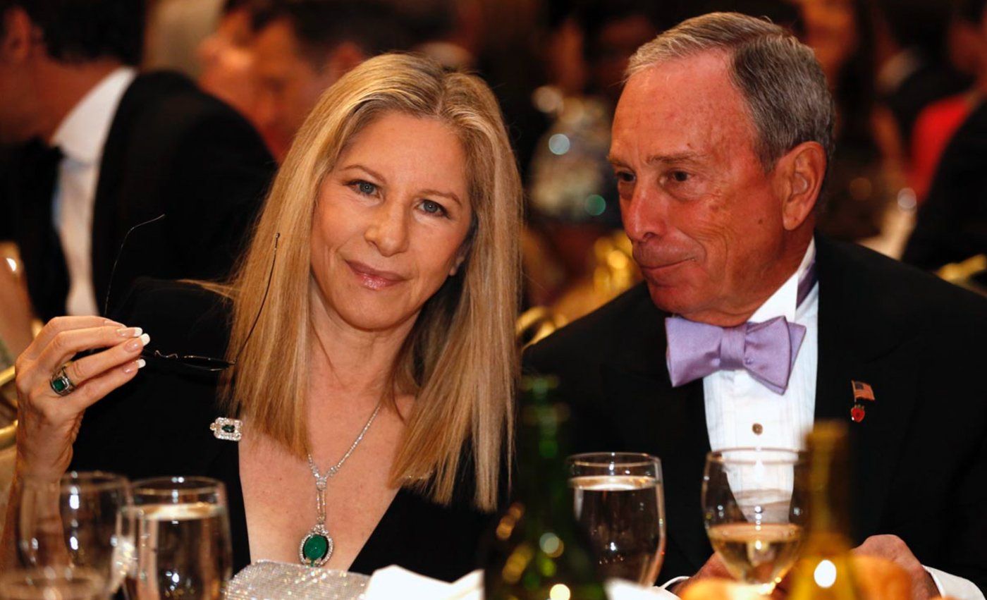 New York Mayor Michael Bloomberg talks with Barbra Streisand during the White House Correspondents' Association (WHCA) dinner in Washington, D.C., on April 27, 2013.