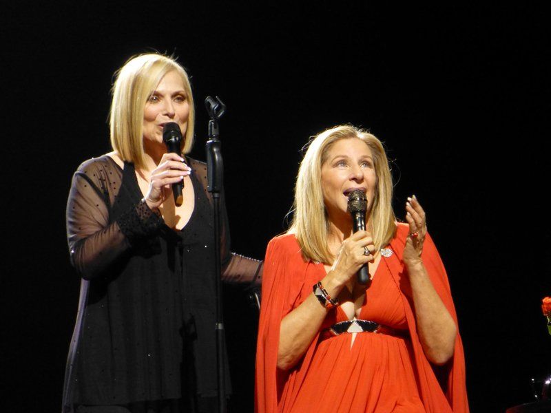 Sisters Roslyn Kind and Barbra Streisand sing together for the first time in Montreal, 2012.