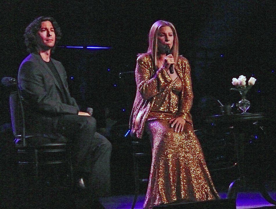 Jason Gould and Barbra Streisand sing together in Berlin.