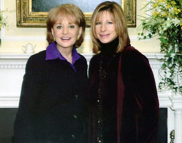 Barbara Walters and Barbra Streisand pose next to each other in 2000.