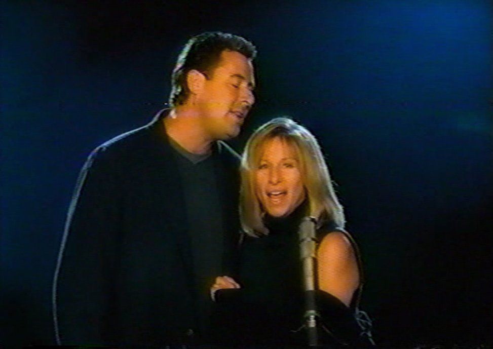 Vince Gill and Barbra Streisand in their music video.